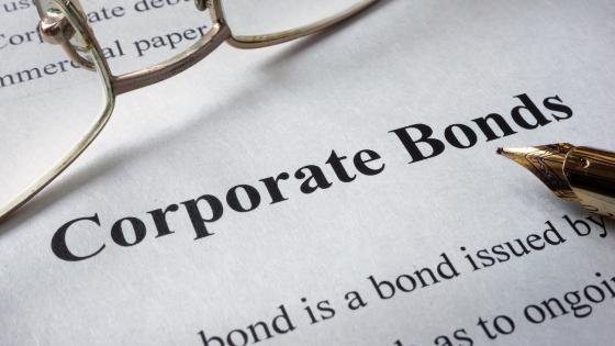 Page of newspaper with words corporate bonds