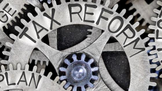tax reform written on metal cogs